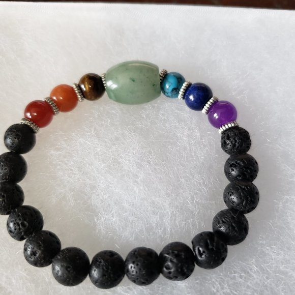 2/20$ NWOT lava beads and gemstone stretch bracelet - Picture 3 of 3